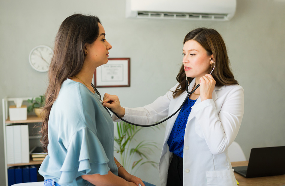 Doctor examining a patient with a stethoscope