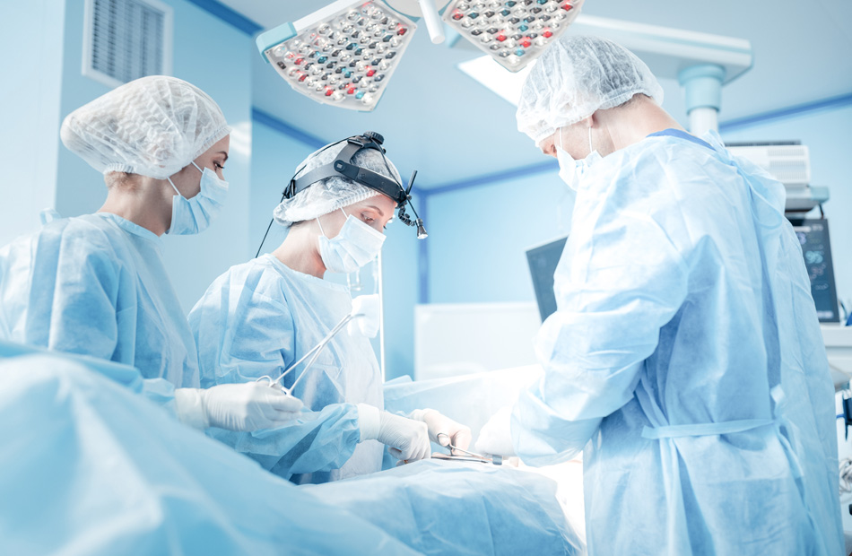 Surgeons performing an operation