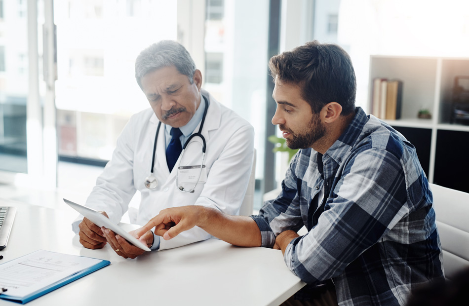 Doctor reviewing information with a patient