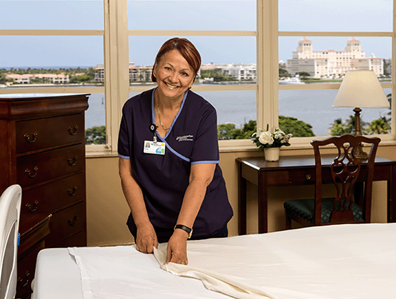 Nurse making bed