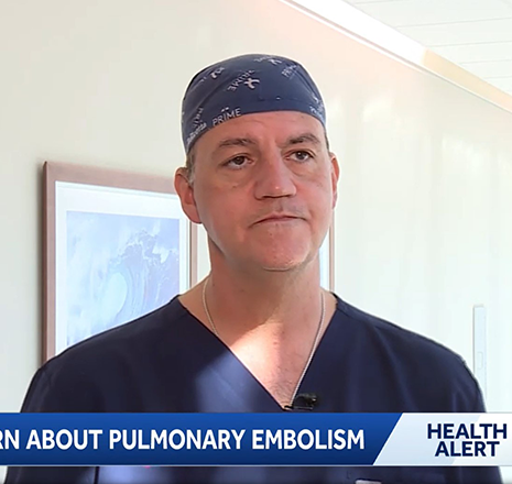 Dr. Joseph Ricotta speaks during a television news interview discussing the signs and risks of pulmonary embolism as part of a health awareness segment